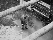 1960: Ingeneer standing in the mud. 